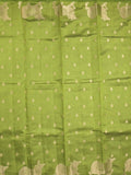 Dupion fancy saree parrot green color allover zari motifs & zari border with rich pallu and running blouse