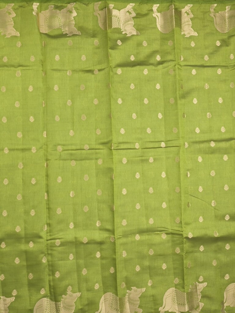 Dupion fancy saree parrot green color allover zari motifs & zari border with rich pallu and running blouse