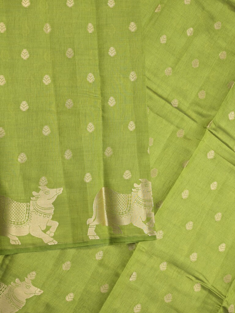 Dupion fancy saree parrot green color allover zari motifs & zari border with rich pallu and running blouse