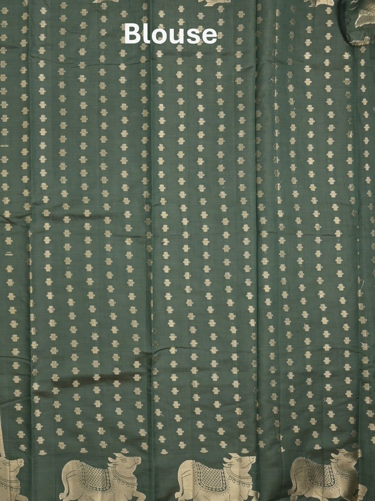 Dupion fancy saree dark green color allover zari motifs & zari border with rich pallu and running blouse