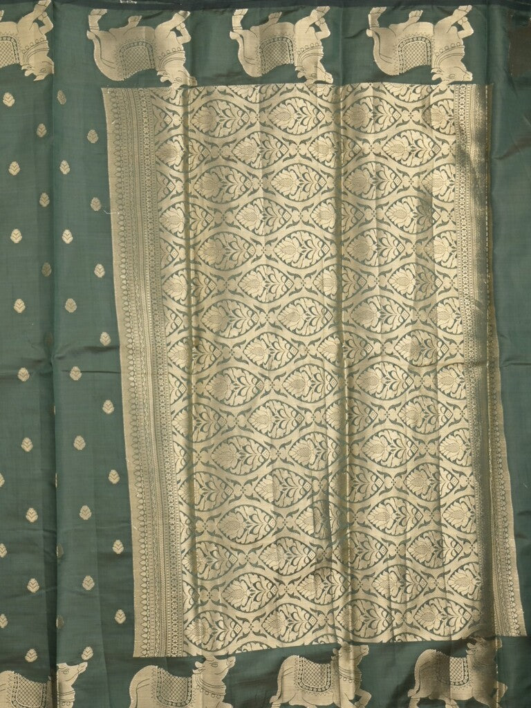 Dupion fancy saree dark green color allover zari motifs & zari border with rich pallu and running blouse