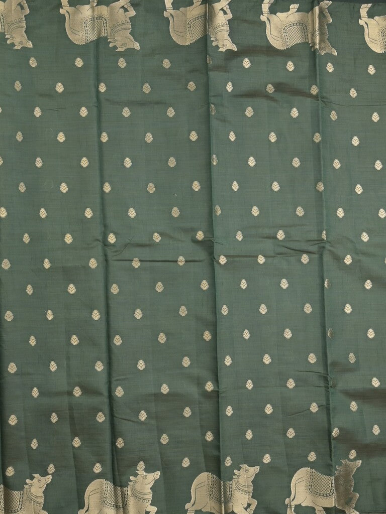 Dupion fancy saree dark green color allover zari motifs & zari border with rich pallu and running blouse