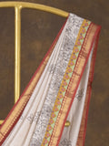 Maheshwari fancy saree in white color with allover prints & zari border with short pallu and contrast blouse