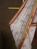 Maheshwari fancy saree in white color with allover prints & zari border with short pallu and contrast blouse