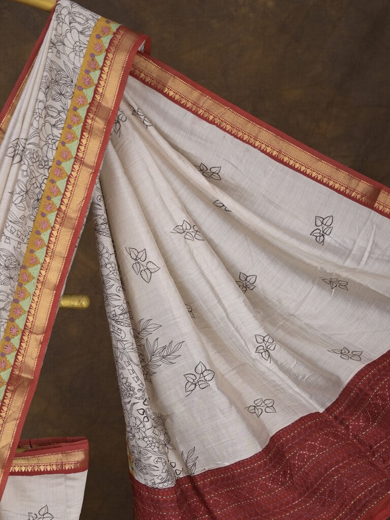Maheshwari fancy saree in white color with allover prints & zari border with short pallu and contrast blouse