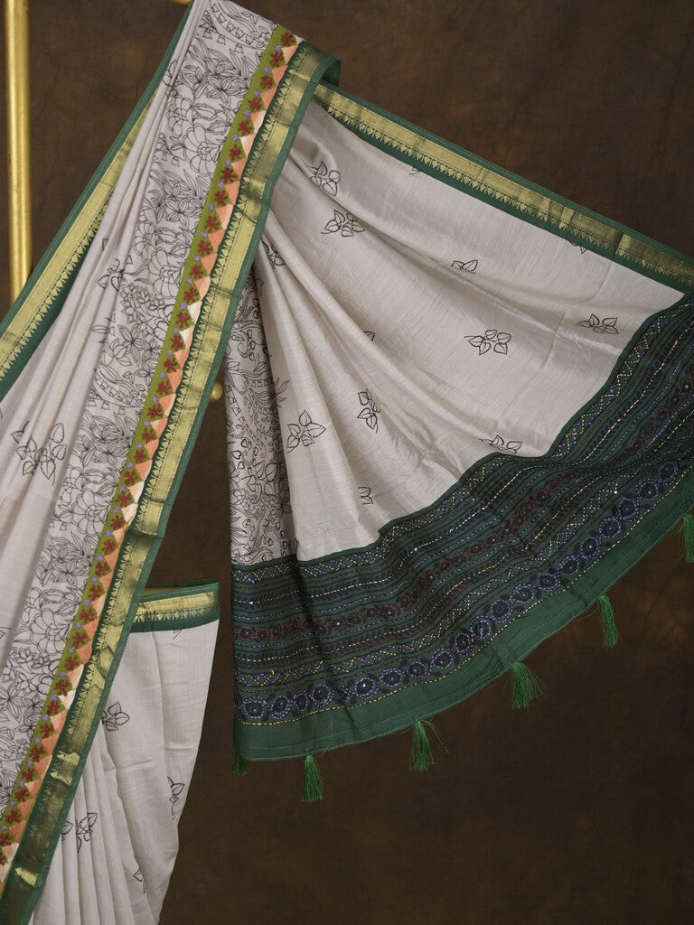 Maheshwari fancy saree in white color with allover prints & zari border with short pallu and contrast blouse