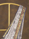 Maheshwari fancy saree in white color with allover prints & zari border with short pallu and contrast blouse