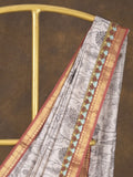 Maheshwari fancy saree in white color with allover prints & zari border with short pallu and contrast blouse