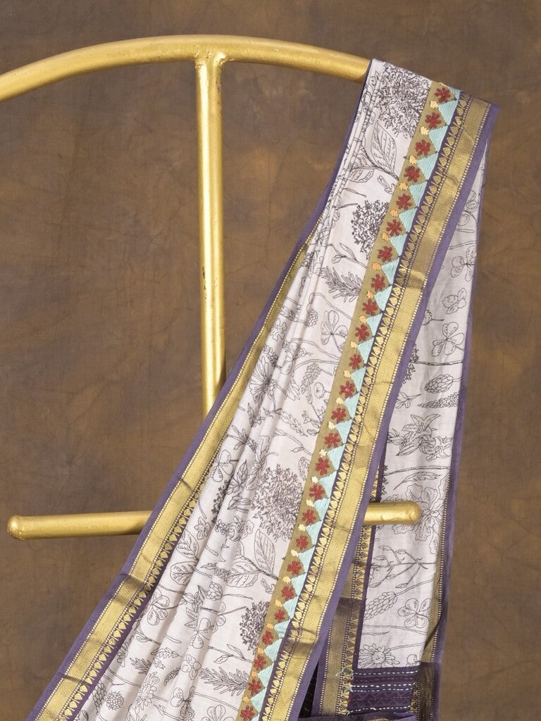 Maheshwari fancy saree in white color with allover prints & zari border with short pallu and contrast blouse