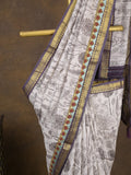 Maheshwari fancy saree in white color with allover prints & zari border with short pallu and contrast blouse