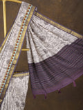 Maheshwari fancy saree in white color with allover prints & zari border with short pallu and contrast blouse