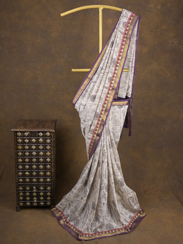 Maheshwari fancy saree in white color with allover prints & zari border with short pallu and contrast blouse