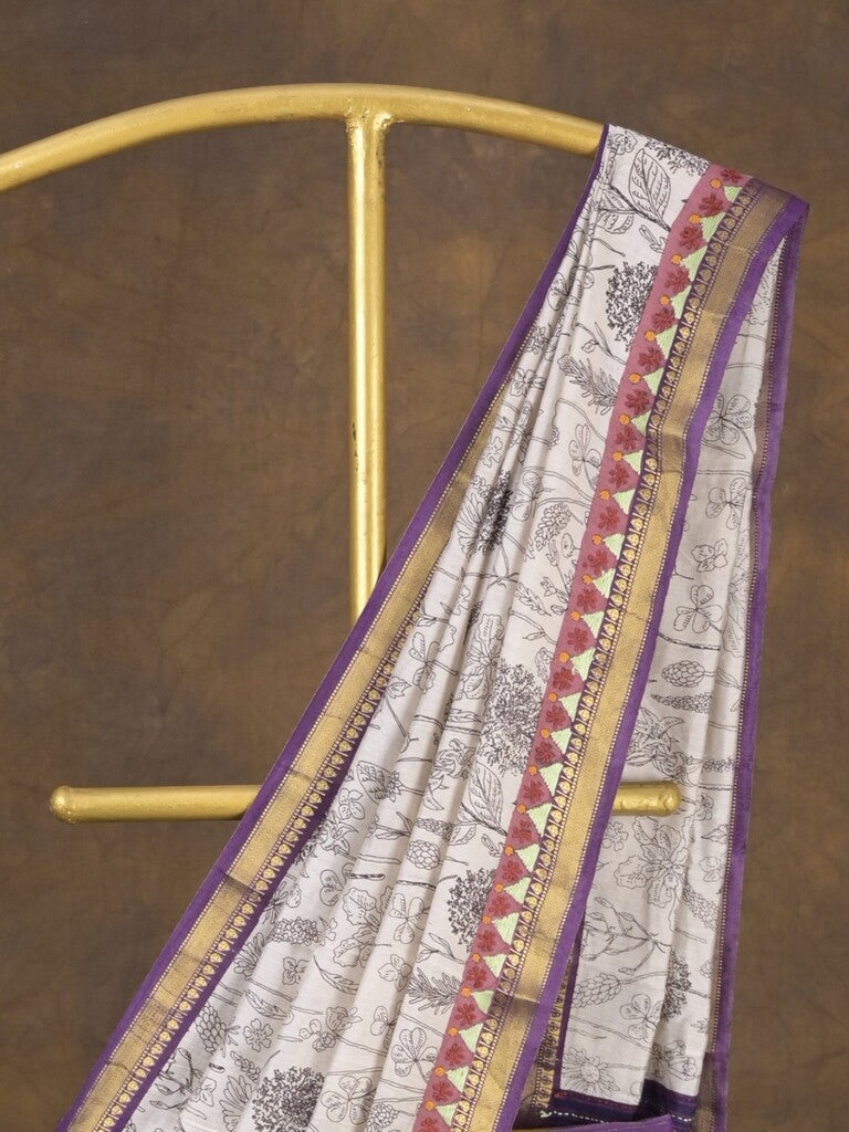 Maheshwari fancy saree in white color with allover prints & zari border with short pallu and contrast blouse