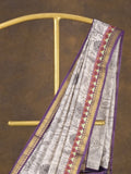 Maheshwari fancy saree in white color with allover prints & zari border with short pallu and contrast blouse