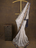 Maheshwari fancy saree in white color with allover prints & zari border with short pallu and contrast blouse