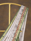 Maheshwari fancy saree in white color with allover prints & zari border with short pallu and contrast blouse