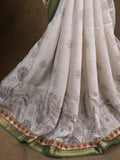 Maheshwari fancy saree in white color with allover prints & zari border with short pallu and contrast blouse