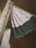 Maheshwari fancy saree in white color with allover prints & zari border with short pallu and contrast blouse