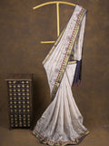 Maheshwari fancy saree in white color with allover prints & zari border with short pallu and contrast blouse