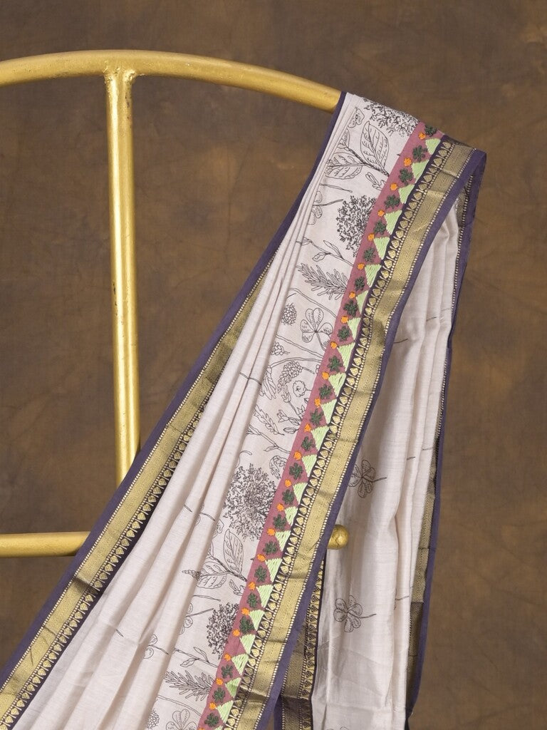 Maheshwari fancy saree in white color with allover prints & zari border with short pallu and contrast blouse