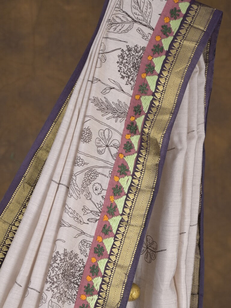 Maheshwari fancy saree in white color with allover prints & zari border with short pallu and contrast blouse