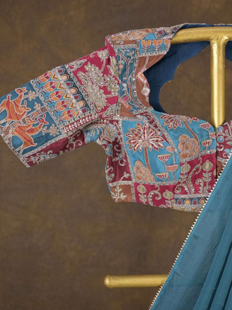 Blue color chinnon plain fancy saree with fancy border and embroidery stitched blouse