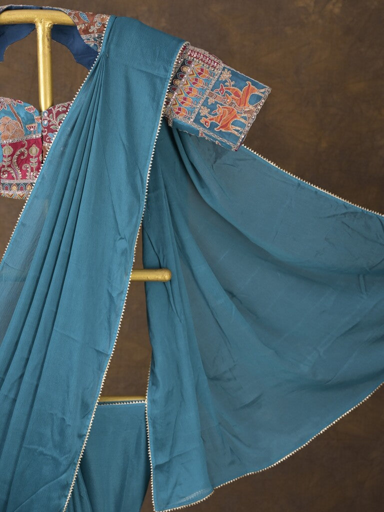 Blue color chinnon plain fancy saree with fancy border and embroidery stitched blouse