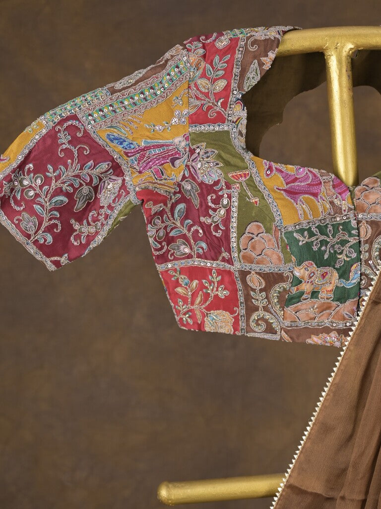 Brown color chinnon plain fancy saree with fancy border and embroidery stitched blouse