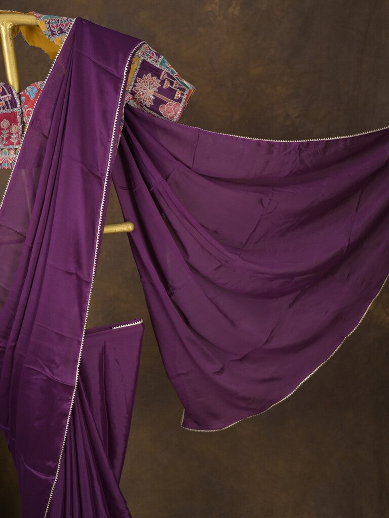 Purple color chinnon plain fancy saree with fancy border and embroidery stitched blouse