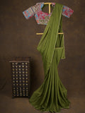 Green color chinnon plain fancy saree with fancy border and embroidery stitched blouse
