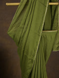 Green color chinnon plain fancy saree with fancy border and embroidery stitched blouse