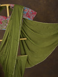 Green color chinnon plain fancy saree with fancy border and embroidery stitched blouse