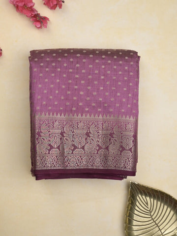Dupion fancy saree in purple color allover zari motifs & zari border with zari pallu and attached contrast blouse