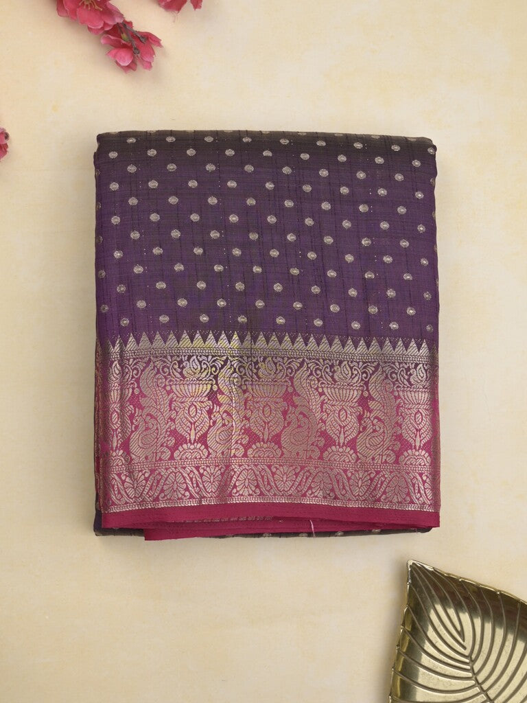 Dupion fancy saree in navy blue color allover zari motifs & zari border with zari pallu and attached contrast blouse