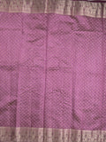 Dupion fancy saree in purple color allover zari motifs & zari border with zari pallu and attached contrast blouse