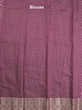 Dupion fancy saree in purple color allover zari motifs & zari border with zari pallu and attached contrast blouse