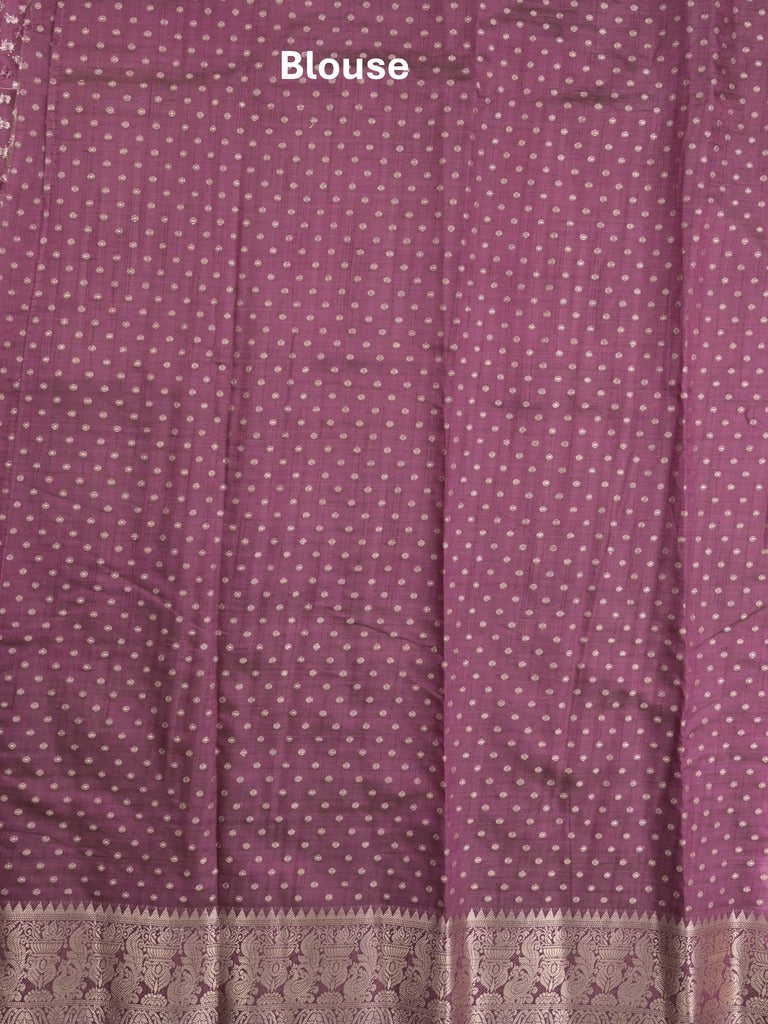 Dupion fancy saree in purple color allover zari motifs & zari border with zari pallu and attached contrast blouse