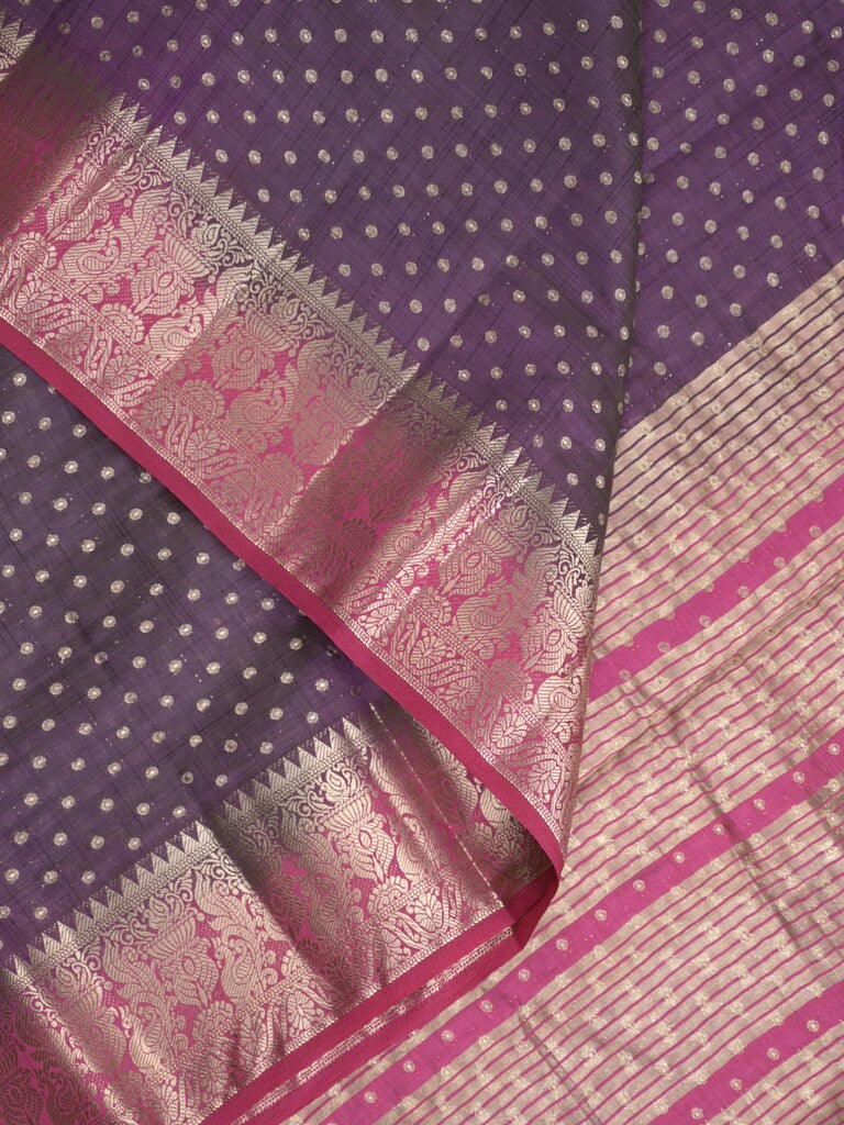 Dupion fancy saree in navy blue color allover zari motifs & zari border with zari pallu and attached contrast blouse