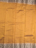 Dupion fancy saree in golden yellow color allover zari motifs & zari border with zari pallu and attached contrast blouse