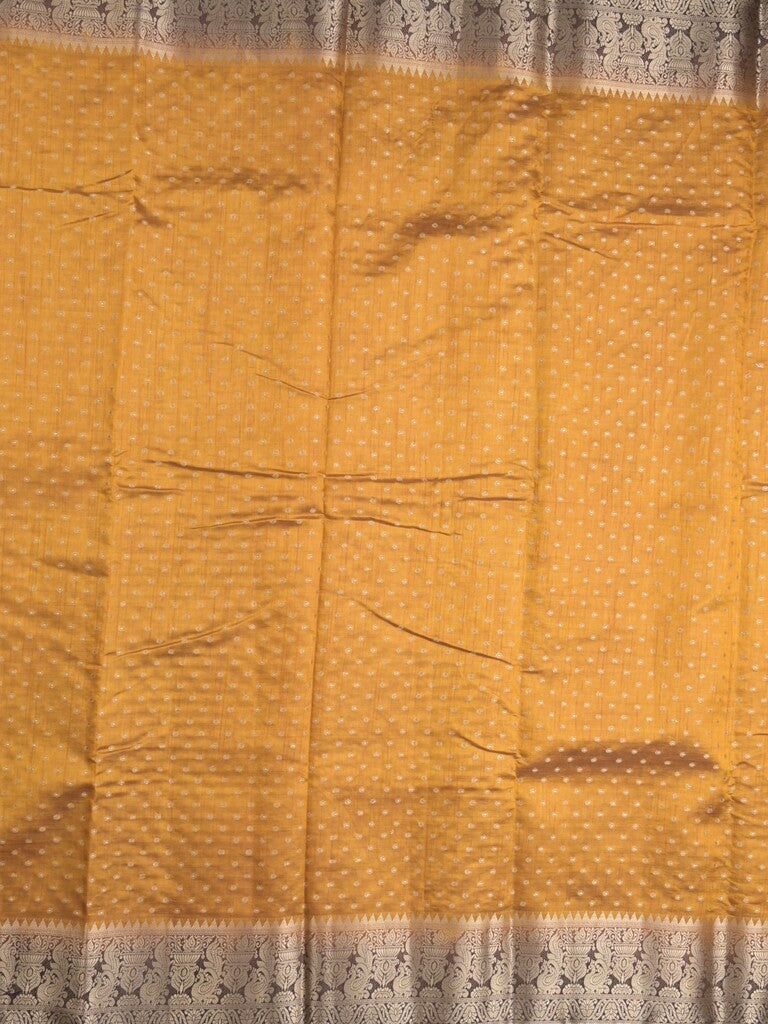 Dupion fancy saree in golden yellow color allover zari motifs & zari border with zari pallu and attached contrast blouse