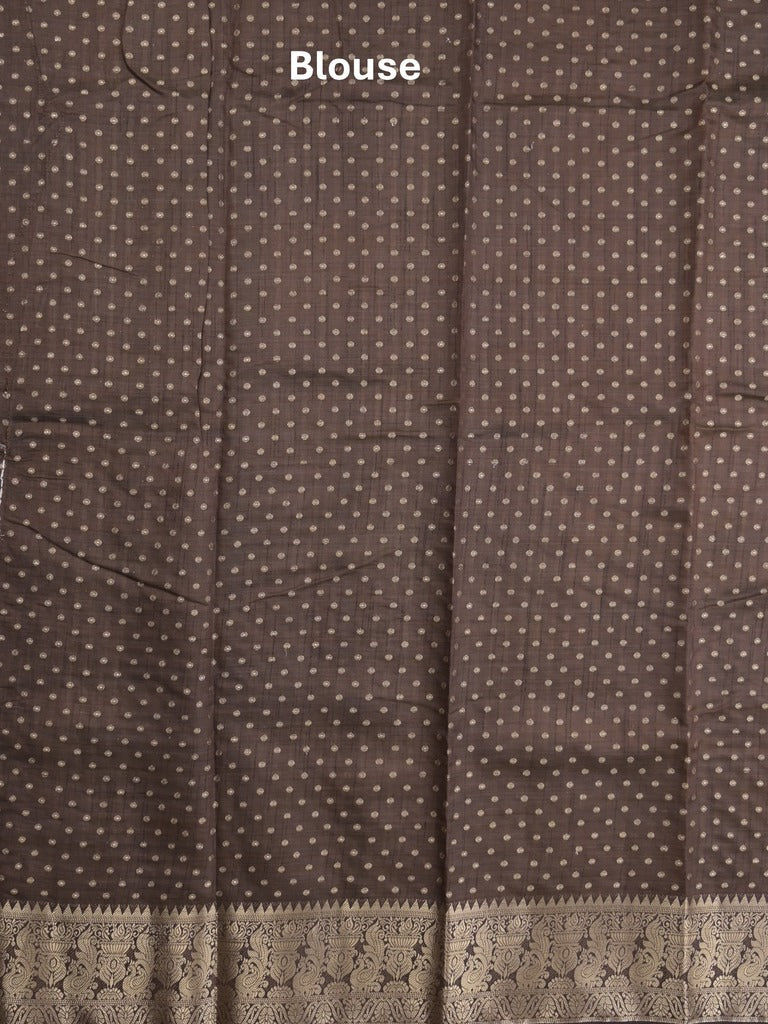 Dupion fancy saree in golden yellow color allover zari motifs & zari border with zari pallu and attached contrast blouse