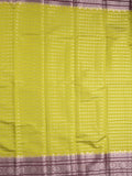 Banaras fancy saree in parrot green color allover zari stripes & zari border with zari pallu and attached contrast blouse