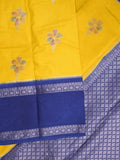 Banaras fancy saree in yellow color allover zari motifs & zari border with brocade pallu and attached blouse