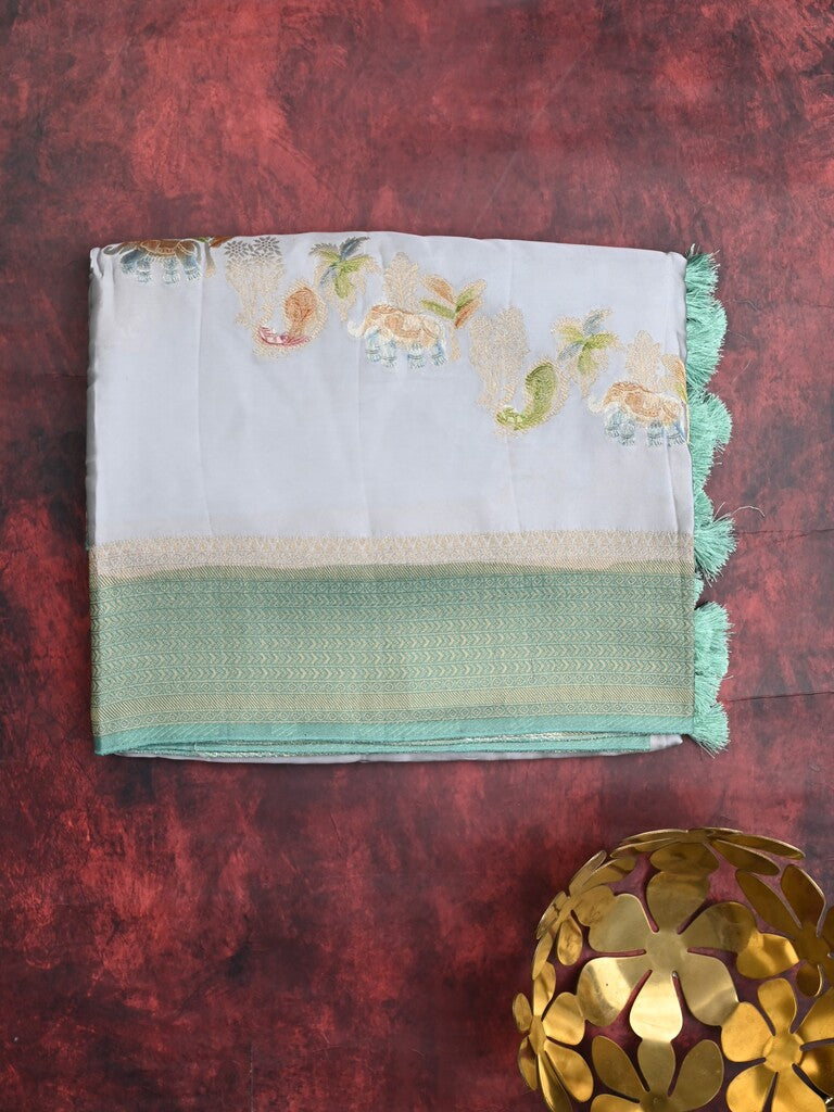 Satin silk fancy saree light blue color allover zari weaves & zari border with zari pallu and plain self blouse