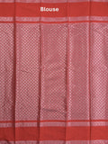 Banaras fancy saree in bottle green color allover zari motifs & zari border with brocade pallu and attached blouse