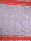 Banaras fancy saree in grey color allover zari motifs & zari border with brocade pallu and attached blouse