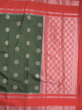 Banaras fancy saree in bottle green color allover zari motifs & zari border with brocade pallu and attached blouse