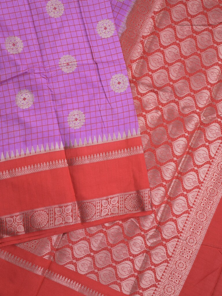 Banaras fancy saree in purple color allover zari motifs & zari border with brocade pallu and attached blouse