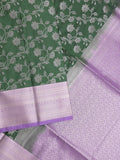 Kanchi pattu saree bottle green color allover zari weaves & zari border with rich pallu and plain blouse
