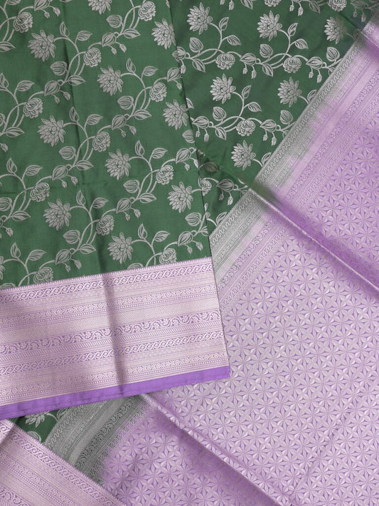 Kanchi pattu saree bottle green color allover zari weaves & zari border with rich pallu and plain blouse